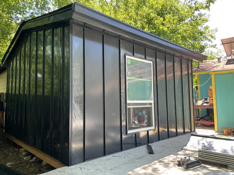 Black standing seam metal wall panels for Metal Roof Installation in Littleton